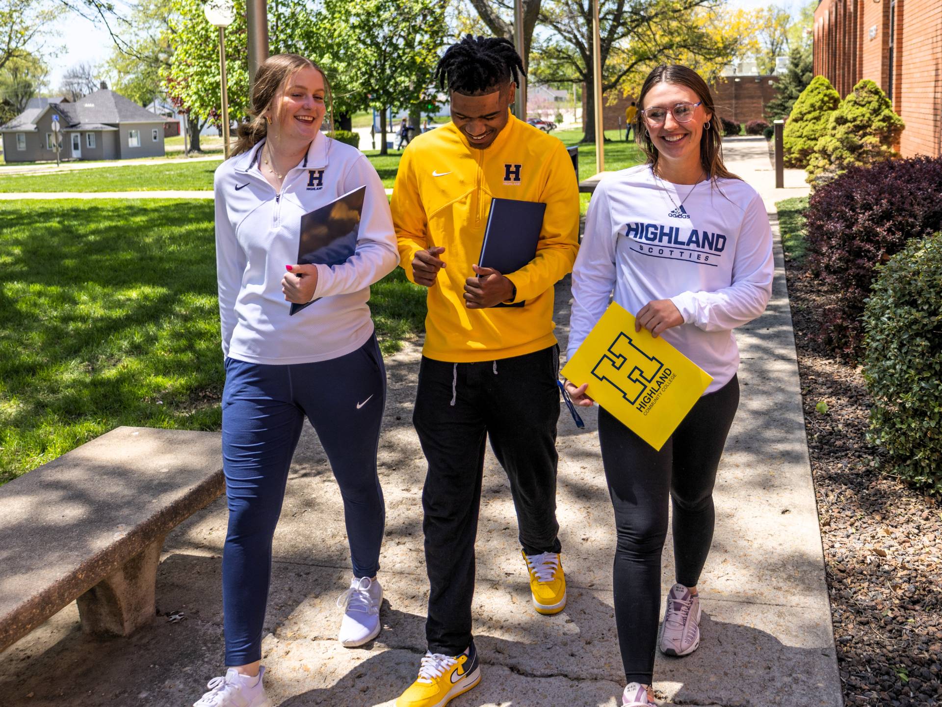 Group of students walking on campus. 
