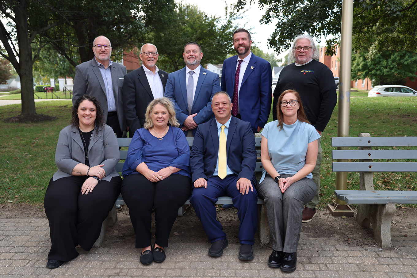 Group photo of Highland Community College Leadership team and visitor President of RCCA.
