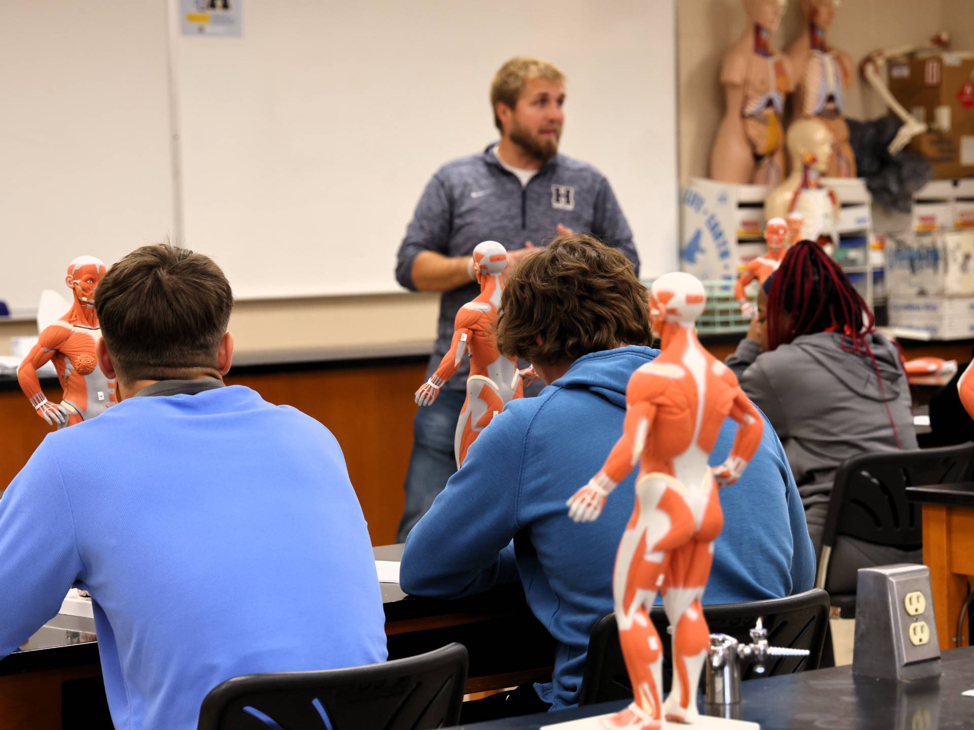 Professor in front of science class
