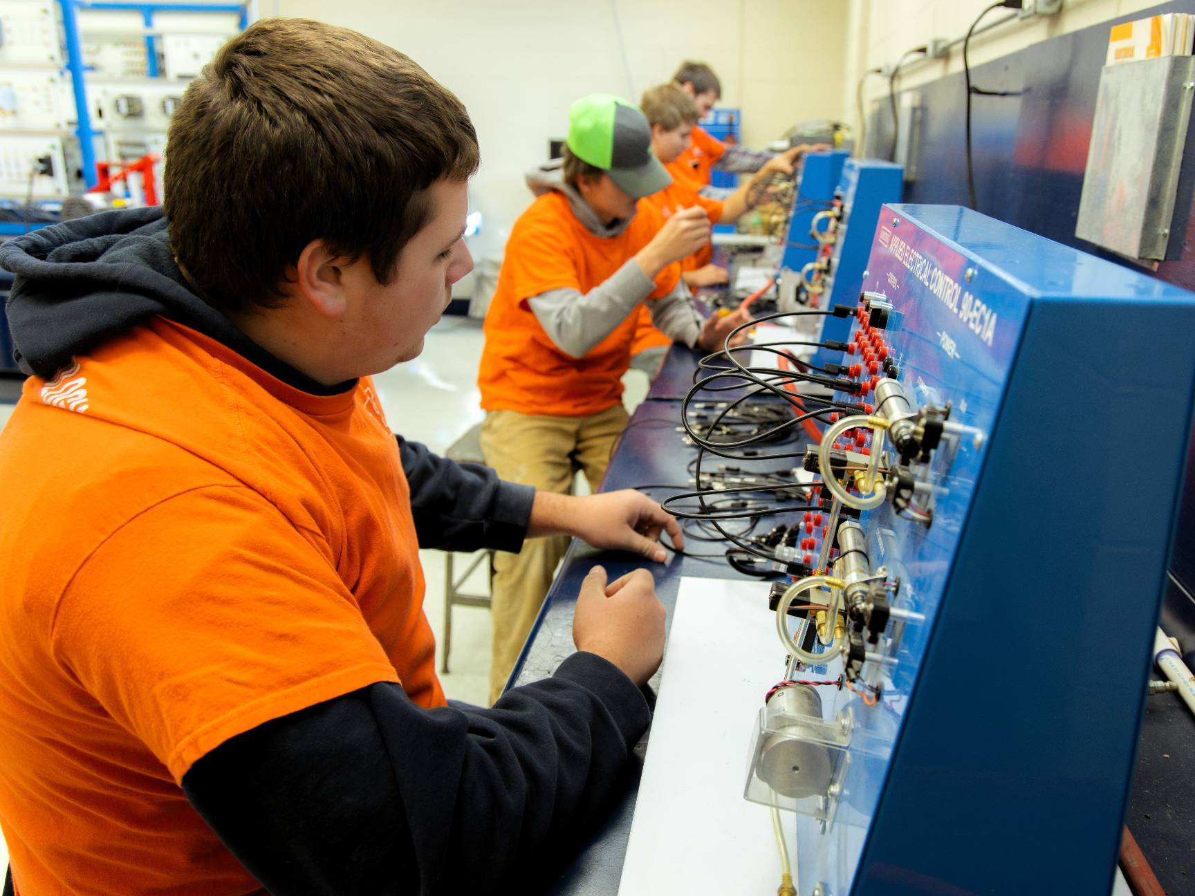 Students working on electrical boards