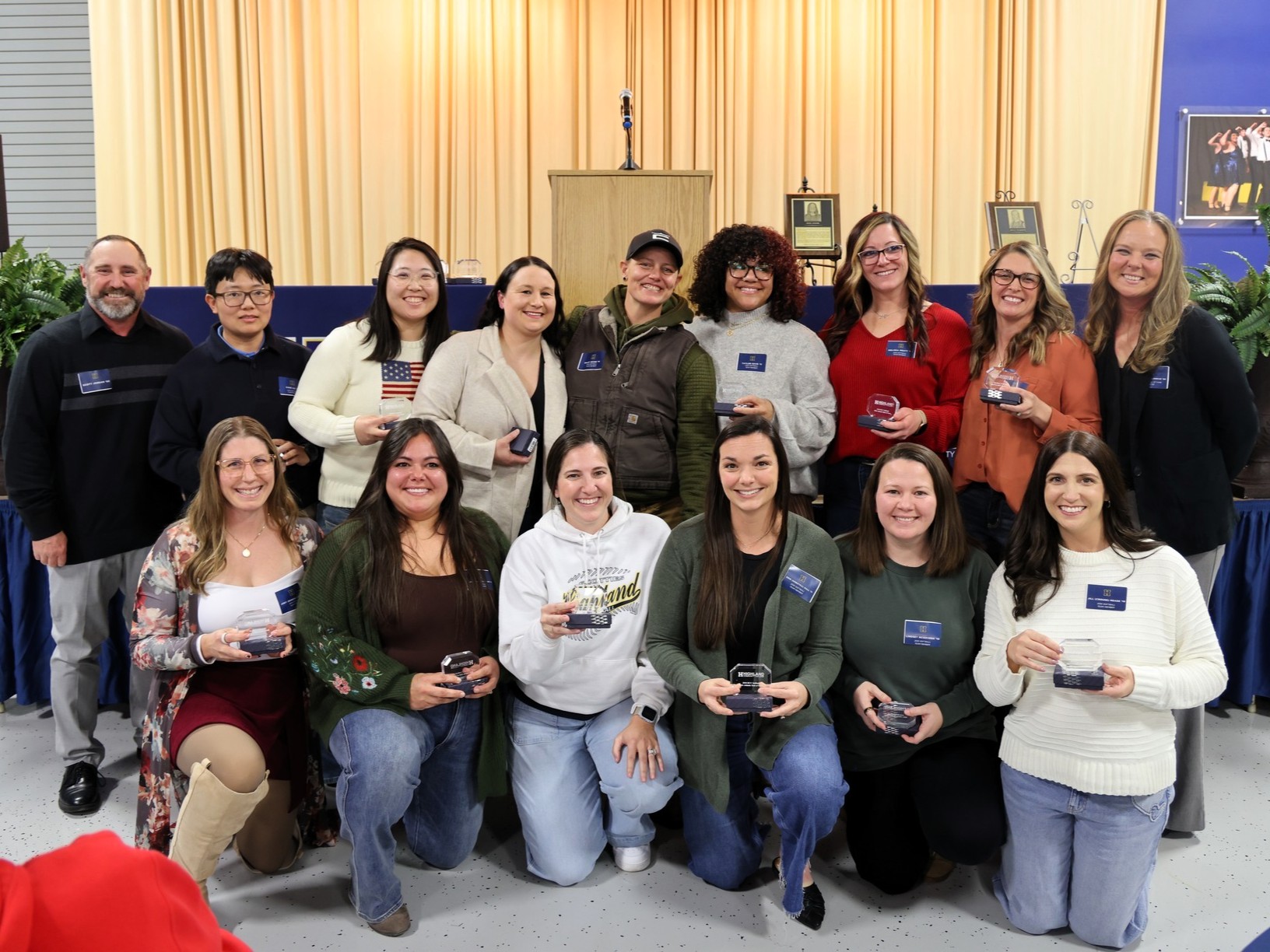 The 2010 Softball team poses as a group for the Hall of Fame Induction Ceremony.