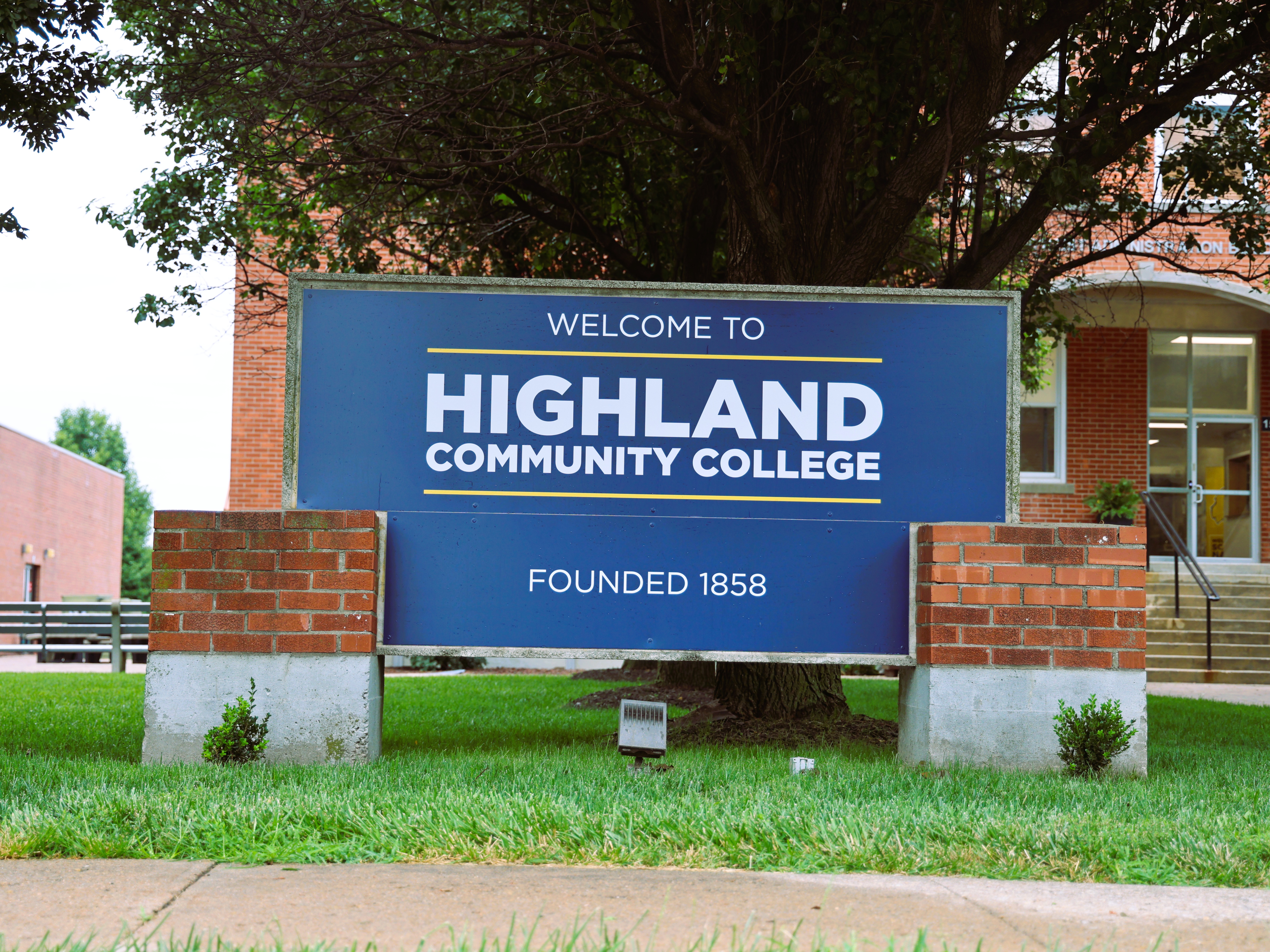 Campus Sign in Front of Admin Building Says Welcome to Highland Community College Founded in 1858