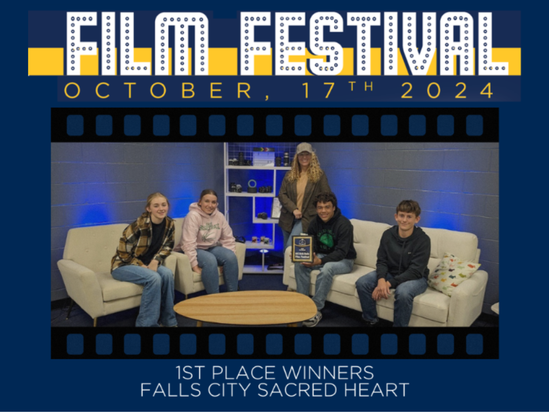 Group photo of the 1st Place Winners, Falls City Sacred Heart, for the Film Festival October 17, 2024. Includes 4 students, and their teacher in the multmedia set room.