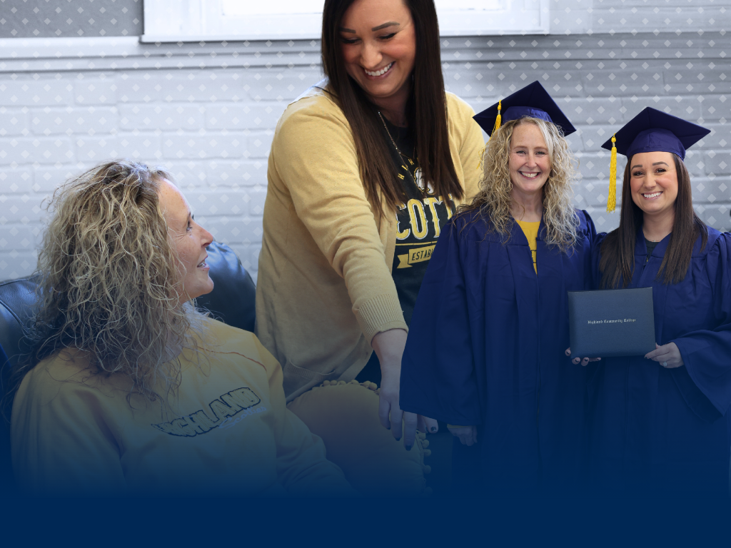 Two students sit together, one is looking up toward the other who is pointing at the screen of a computer. In the corner, the same students are posed in their graduation attire. Text reads 'Return, Reconnect & Achieve Scottie Gold"